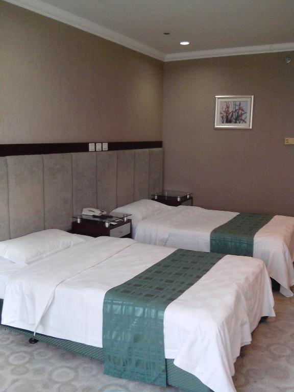 Garden City Hotel Csengtu Szoba fotó