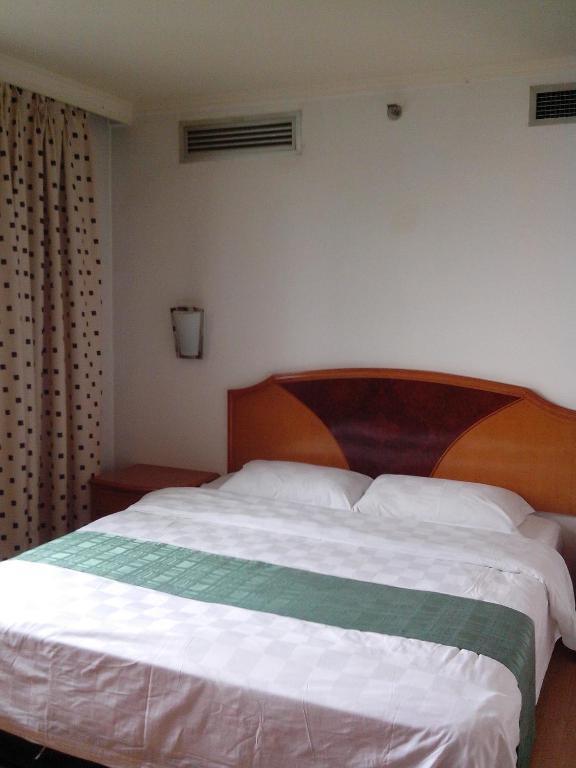 Garden City Hotel Csengtu Szoba fotó