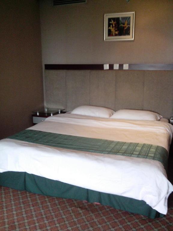Garden City Hotel Csengtu Szoba fotó