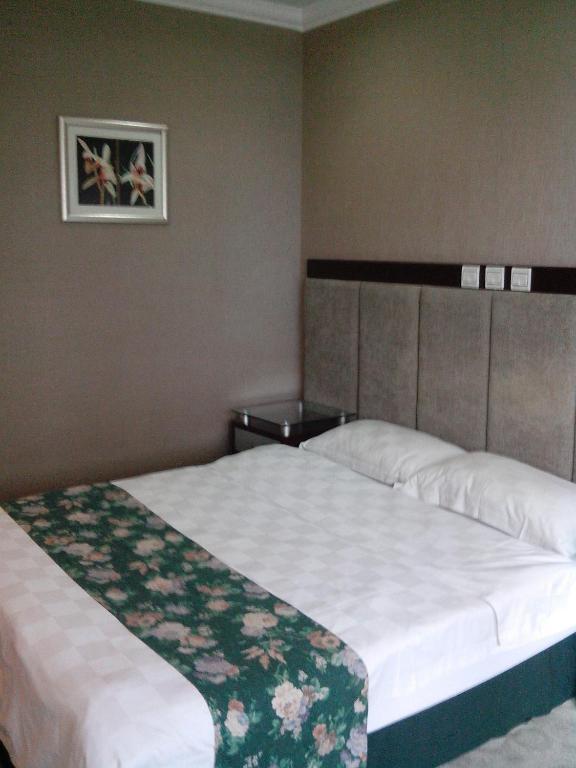 Garden City Hotel Csengtu Szoba fotó