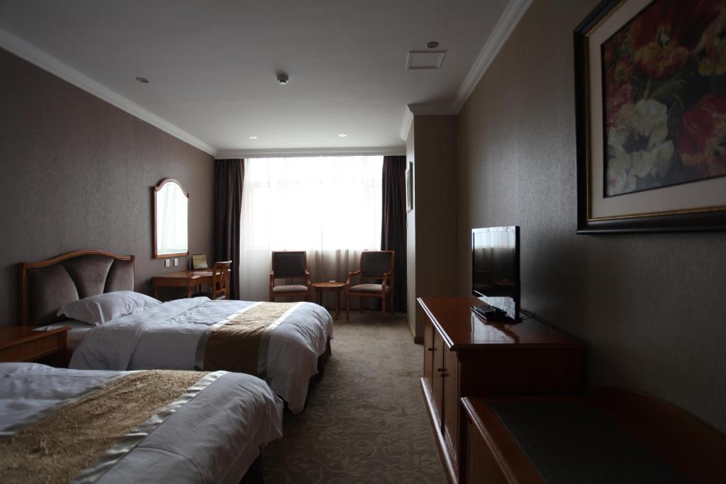 Garden City Hotel Csengtu Szoba fotó
