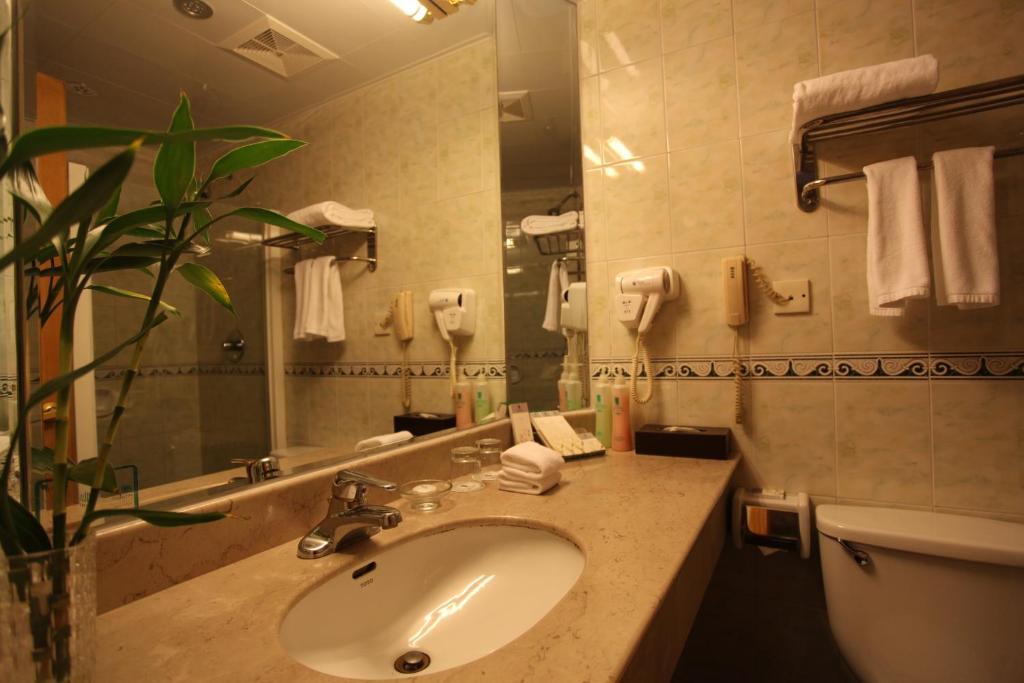 Garden City Hotel Csengtu Szoba fotó